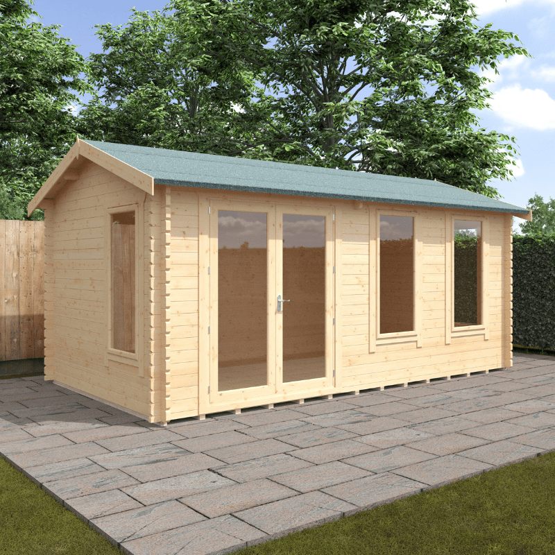 Wooden garden shed with a green roof on a paved patio area with trees in the background.
