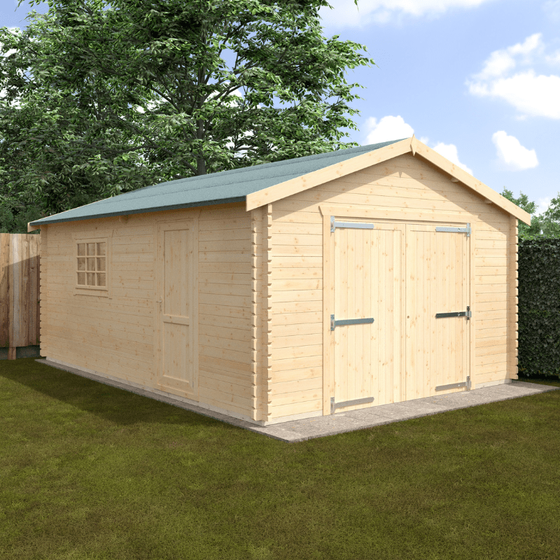 Wooden shed with a green roof on a grassy area with trees in the background
