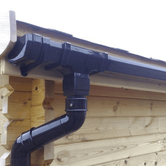 Black guttering system attached to a wooden cabin