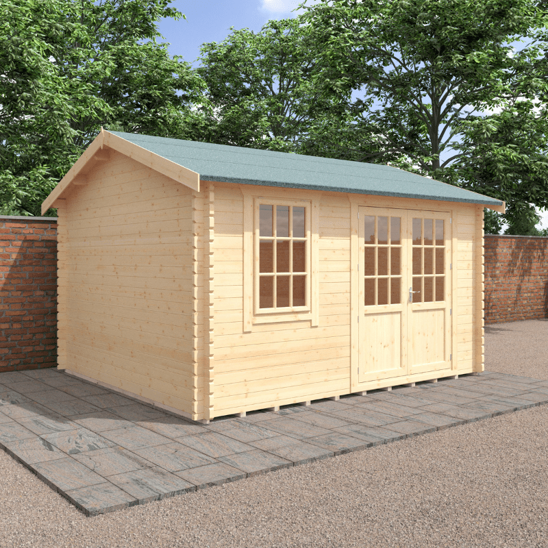 Wooden shed with a green roof on a paved area with trees in the background