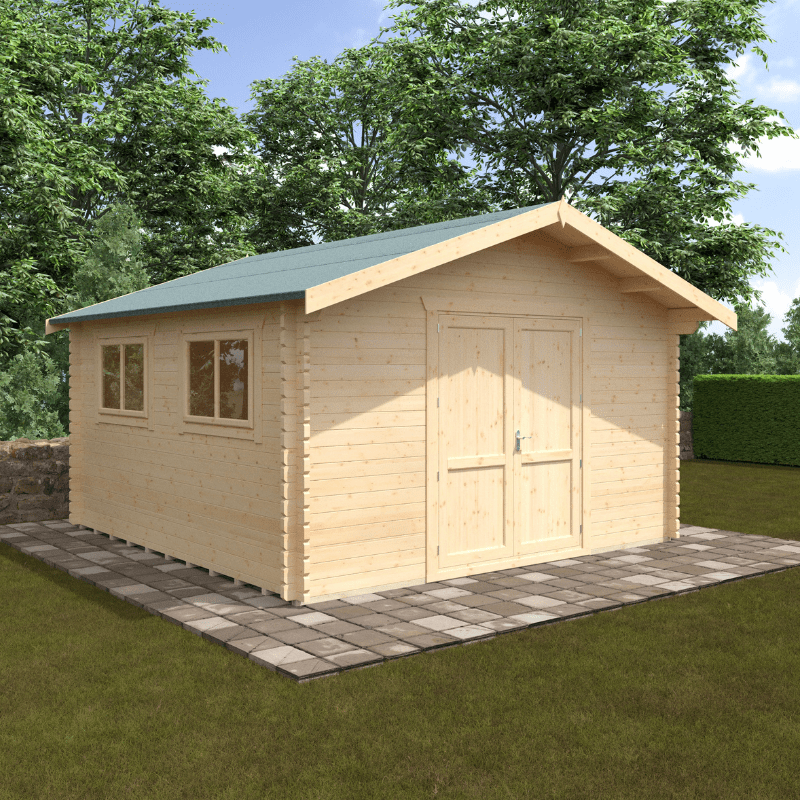 Wooden shed with a green roof on a grassy area with trees in the background