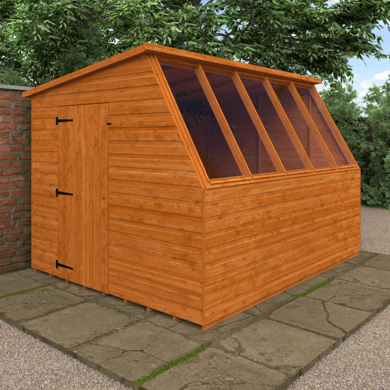 Wooden shed with a glass panel on a stone patio