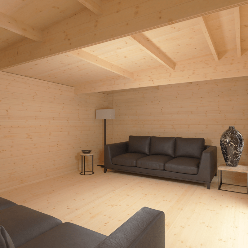 Modern living room with wooden walls and ceiling, featuring a gray sofa and decorative items.