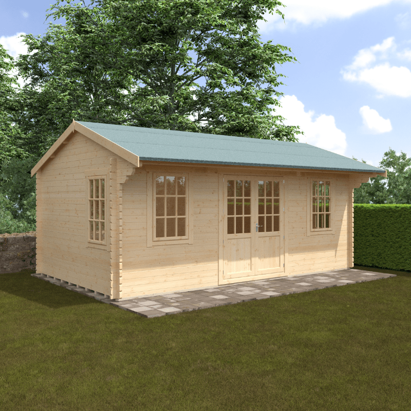 Wooden cabin with a green roof on a grassy area with trees in the background