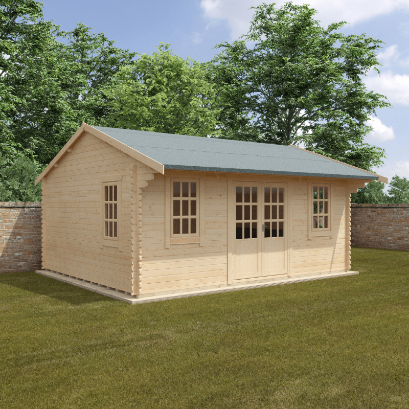 Wooden cabin with a green roof on a grassy area with trees in the background
