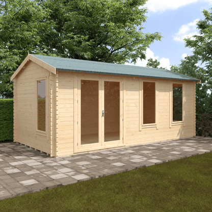 Wooden garden shed with a green roof in a garden setting