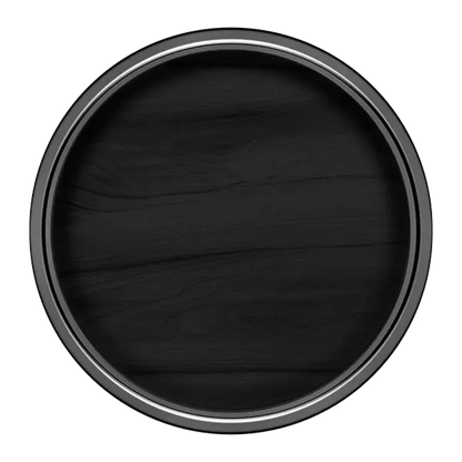 Round black pan with metallic rim on a white background