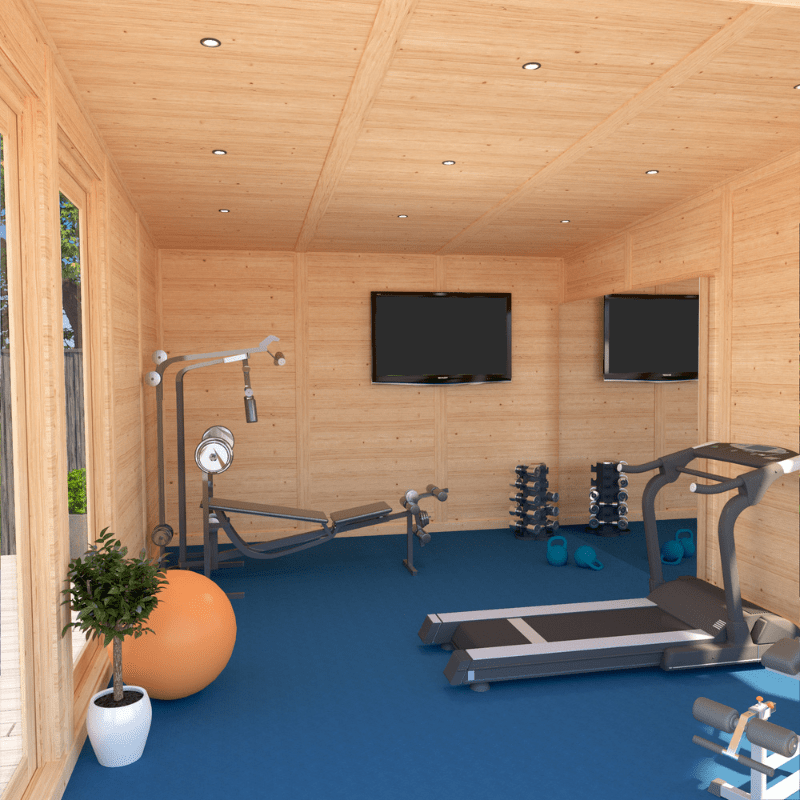 Gym room with wooden walls, blue floor, and fitness equipment.