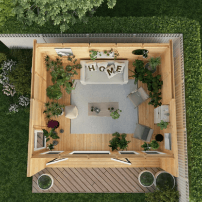 Top-down view of a small wooden house with furniture and plants on a grassy background