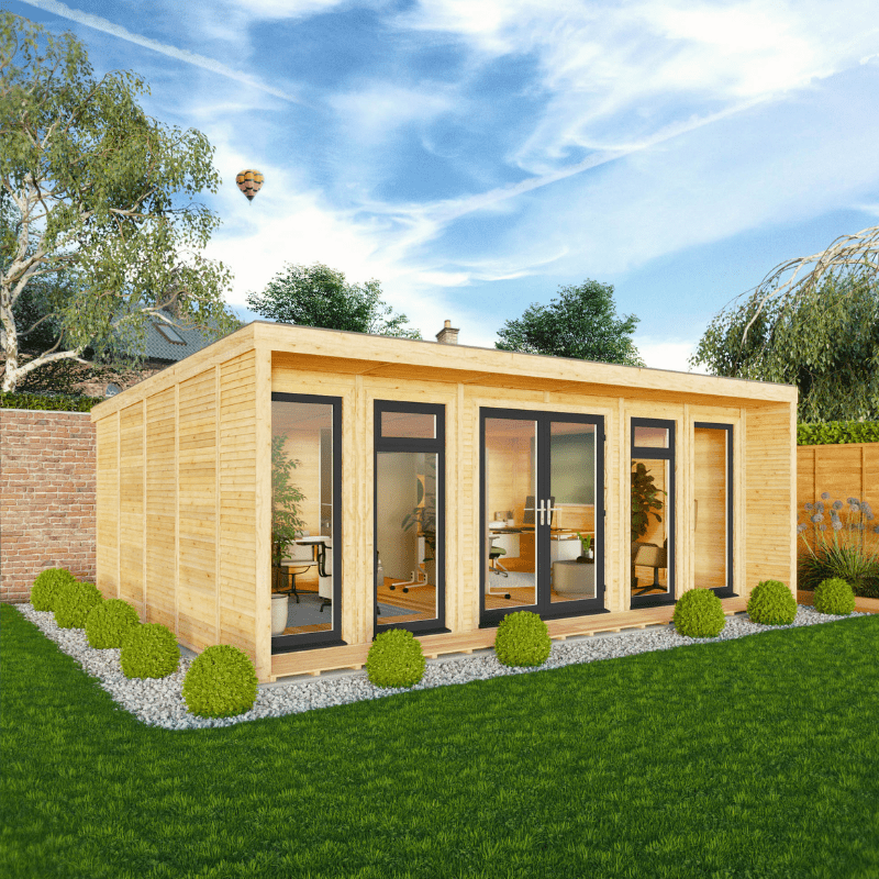 Wooden garden office with large windows in a garden setting