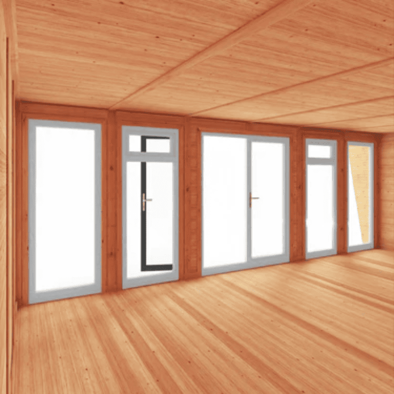 Wooden cabin interior with large windows