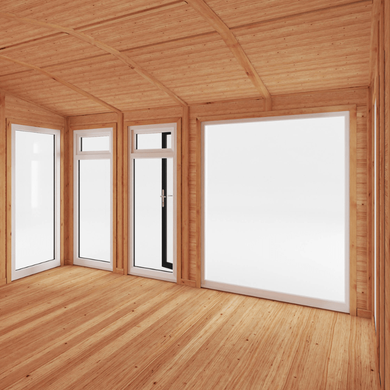 Wooden cabin interior with large windows