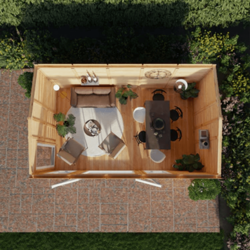 Top-down view of a small wooden cabin with furniture and decor.