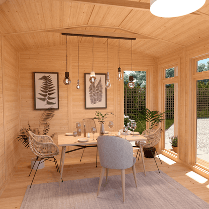 Dining area with wooden walls, a table, chairs, and large windows.
