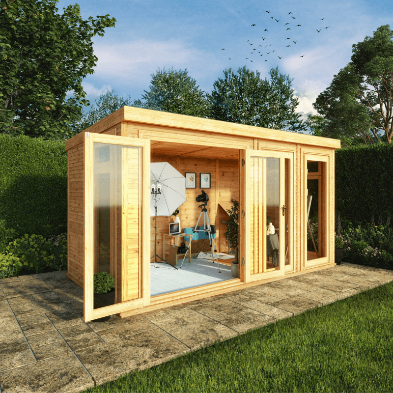 Wooden garden office with open doors in a garden setting