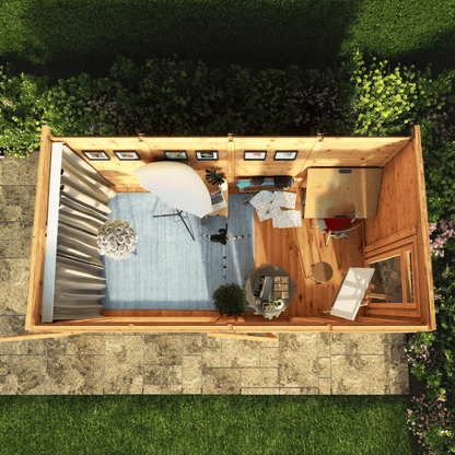 Top-down view of a small wooden cabin with furniture and decor inside.