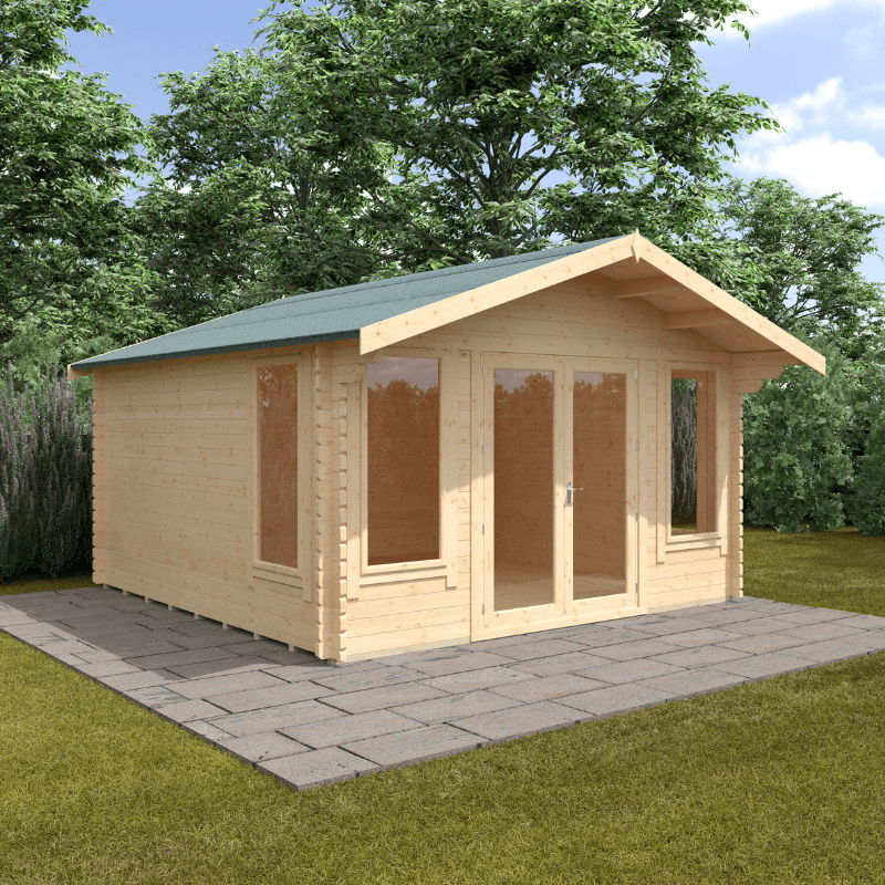 Wooden cabin with a green roof on a paved area surrounded by trees