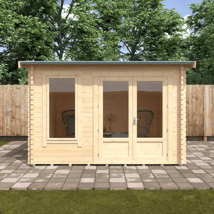 Wooden garden shed with glass doors and windows, surrounded by trees and a wooden fence.