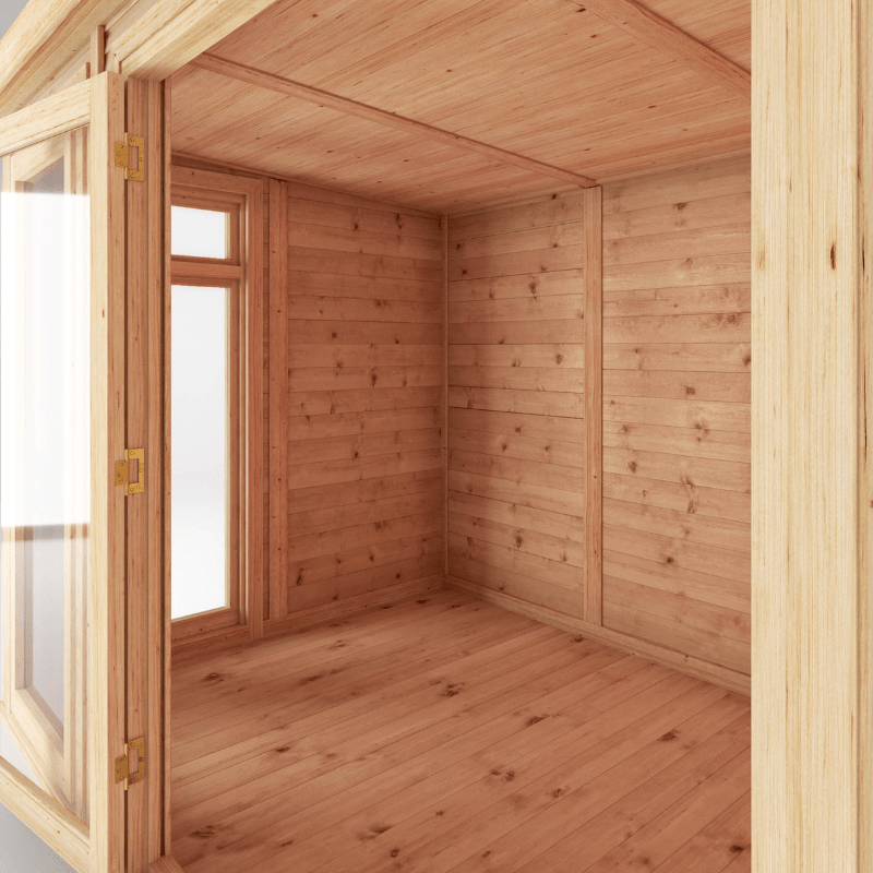 Wooden cabin interior with glass doors and windows.